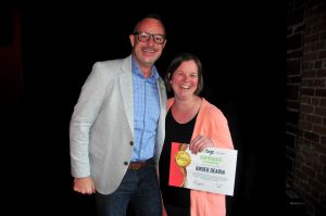 BGC Okanagan long-service awards recipient from the the 15 year category, standing with CEO Jeremy Welder