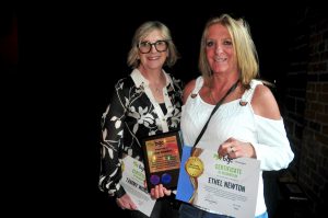 BGC Okanagan staff members standing with one another after receiving the long-service award in the 30 years category.